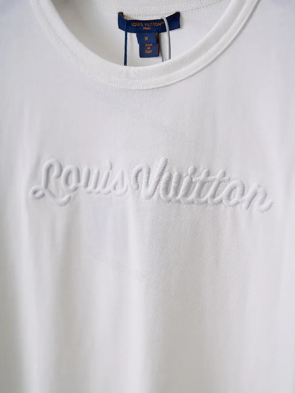View 3 of White cotton T-shirt with luxury script embroidery for everyday elegance