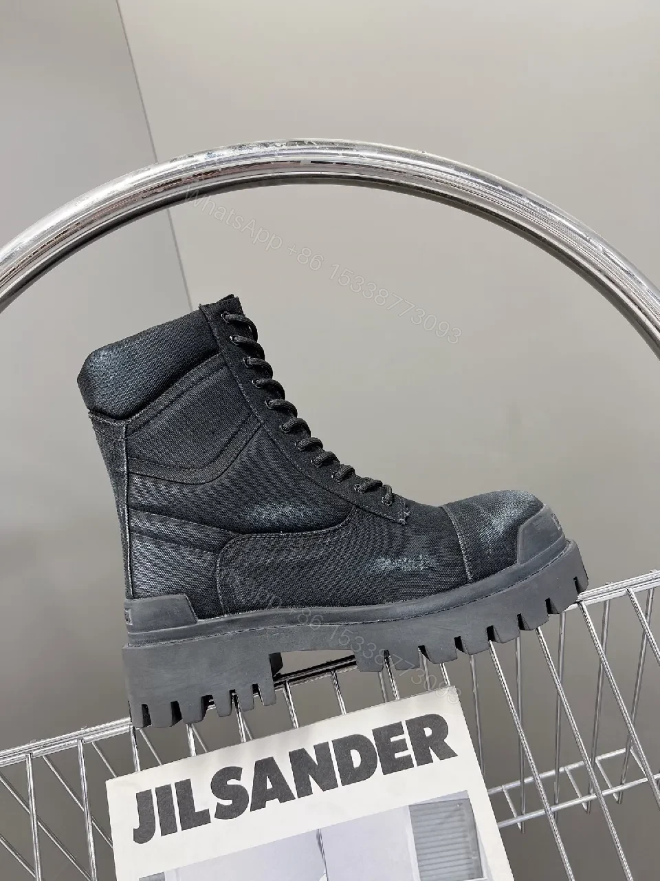 View 3 of Bold Black Combat Boots with Rugged Texture