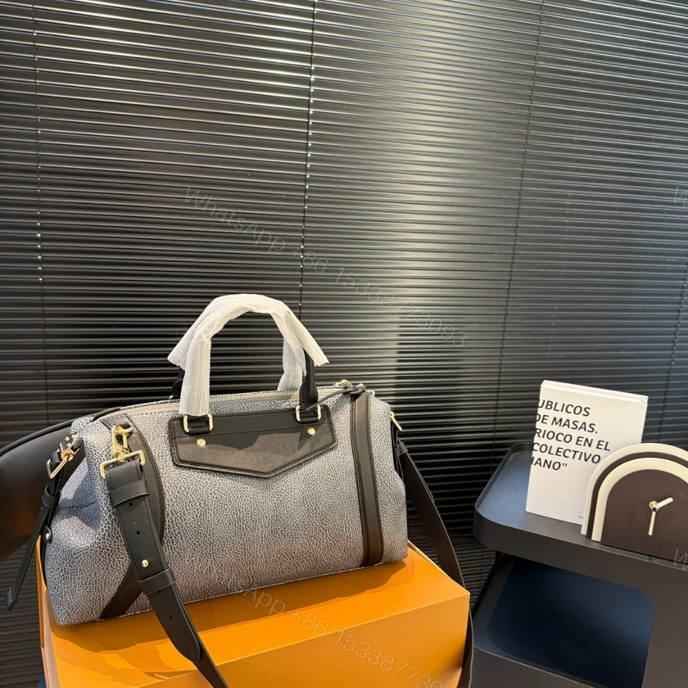 View 5 of LOUIS VUITTON LV BIKER MM DARK DENIM 37CM M14702