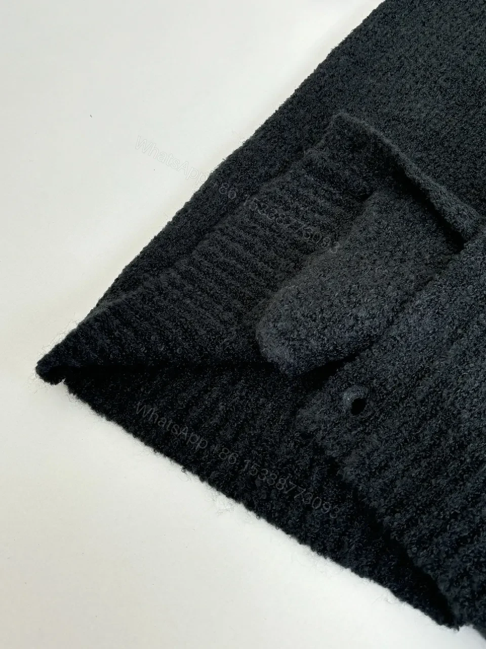View 9 of Textured Bouclé Knit Cardigan - Subtle LV Logo, Versatile Warmth