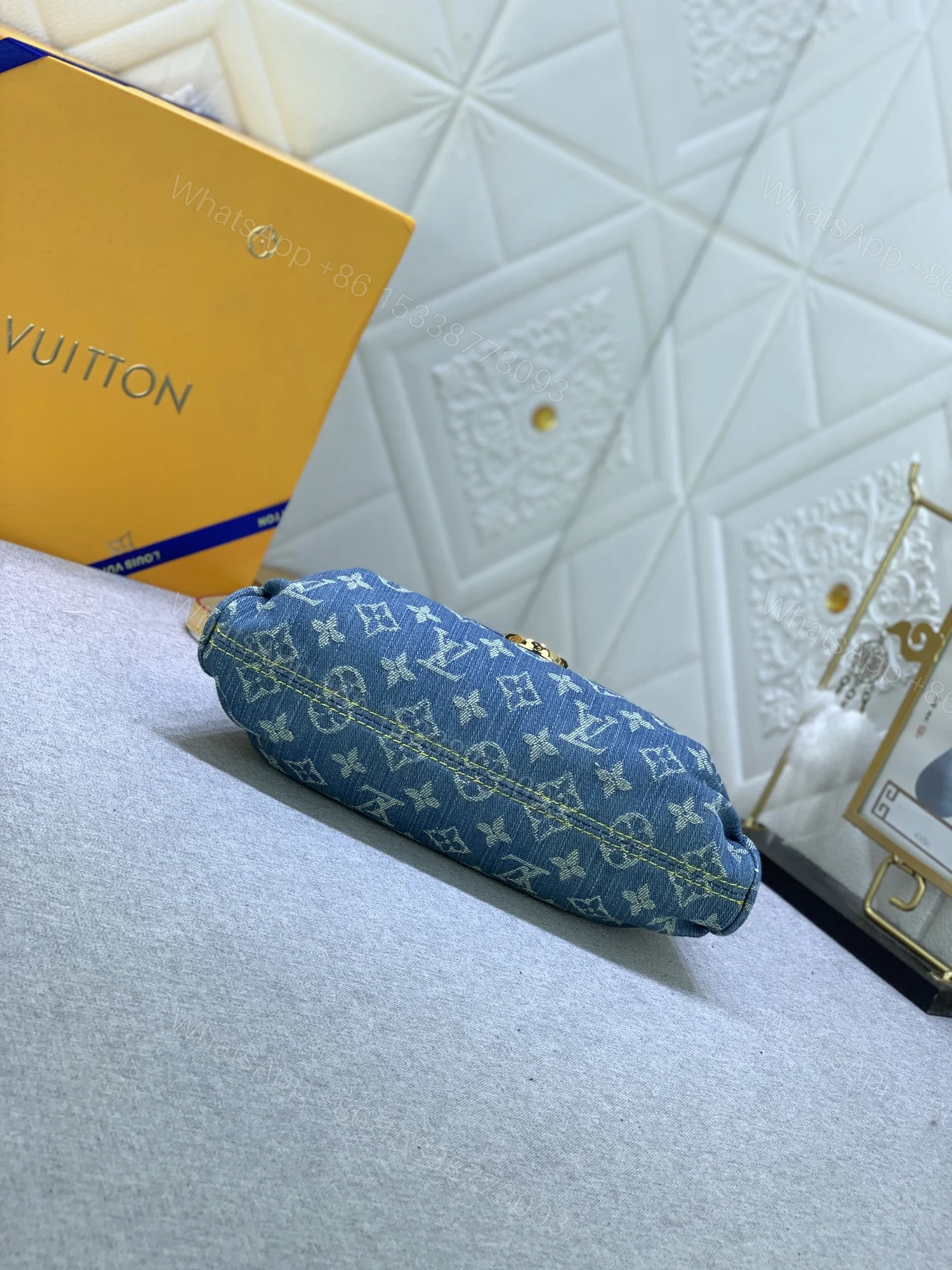View 3 of Louis Vuitton Pleaty bag in blue denim