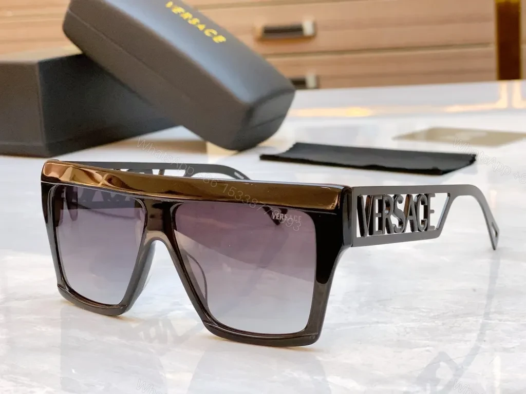 View 5 of Bold Black & Gold Luxe Sunglasses - Statement Frame, All-Day Comfort