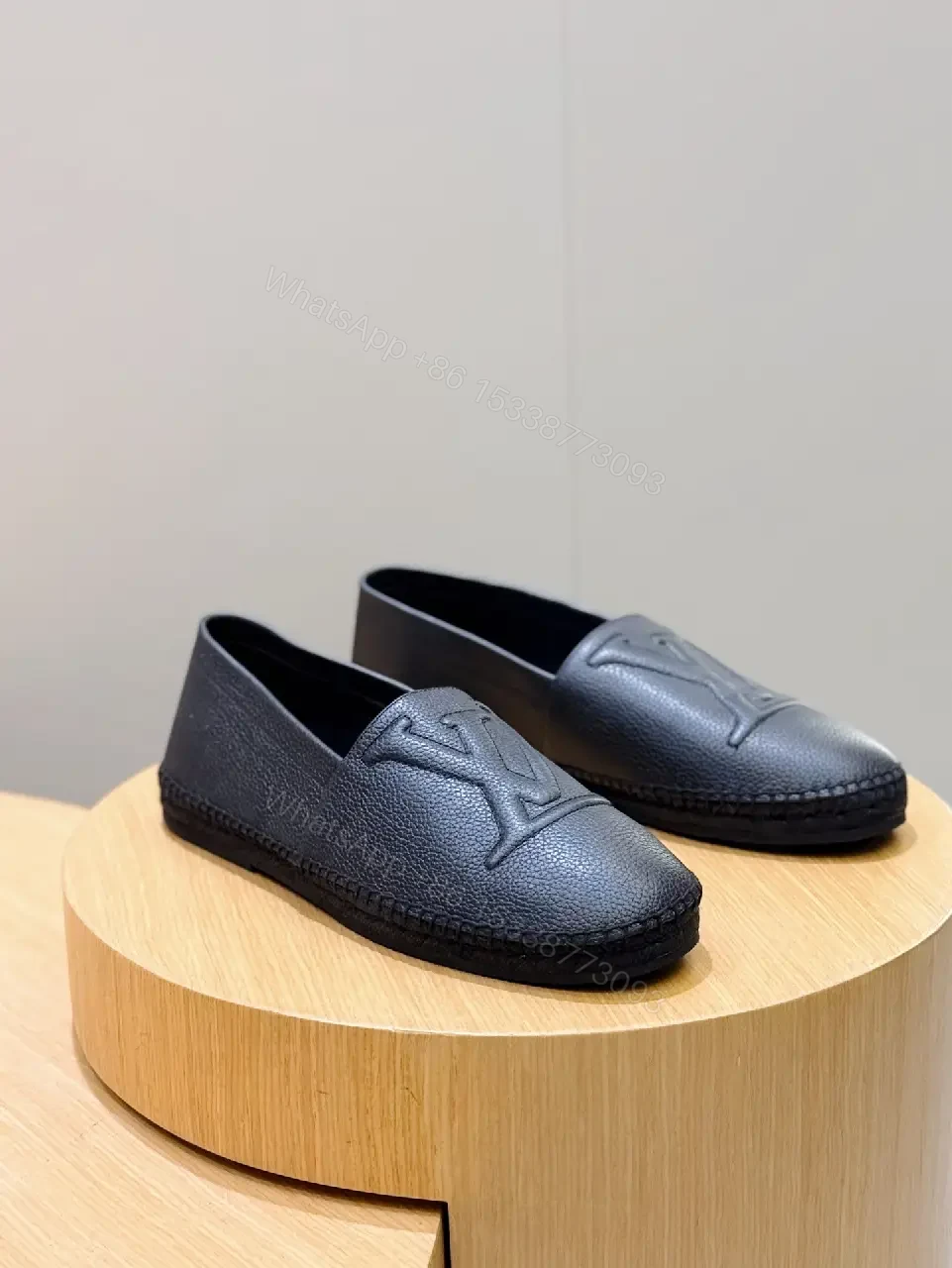 View 8 of Textured Leather Loafers: Subtle Monogram, Modern Comfort