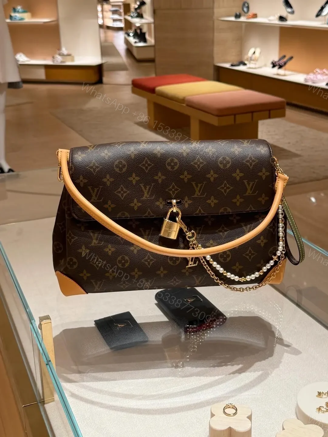 View 3 of Louis Vuitton Hide Away MM bag in Monogram canvas
