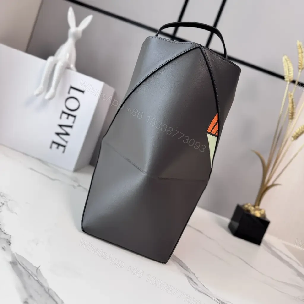 View 7 of Bold Geometry Fox Tote: Color-Block Faux Leather Carryall