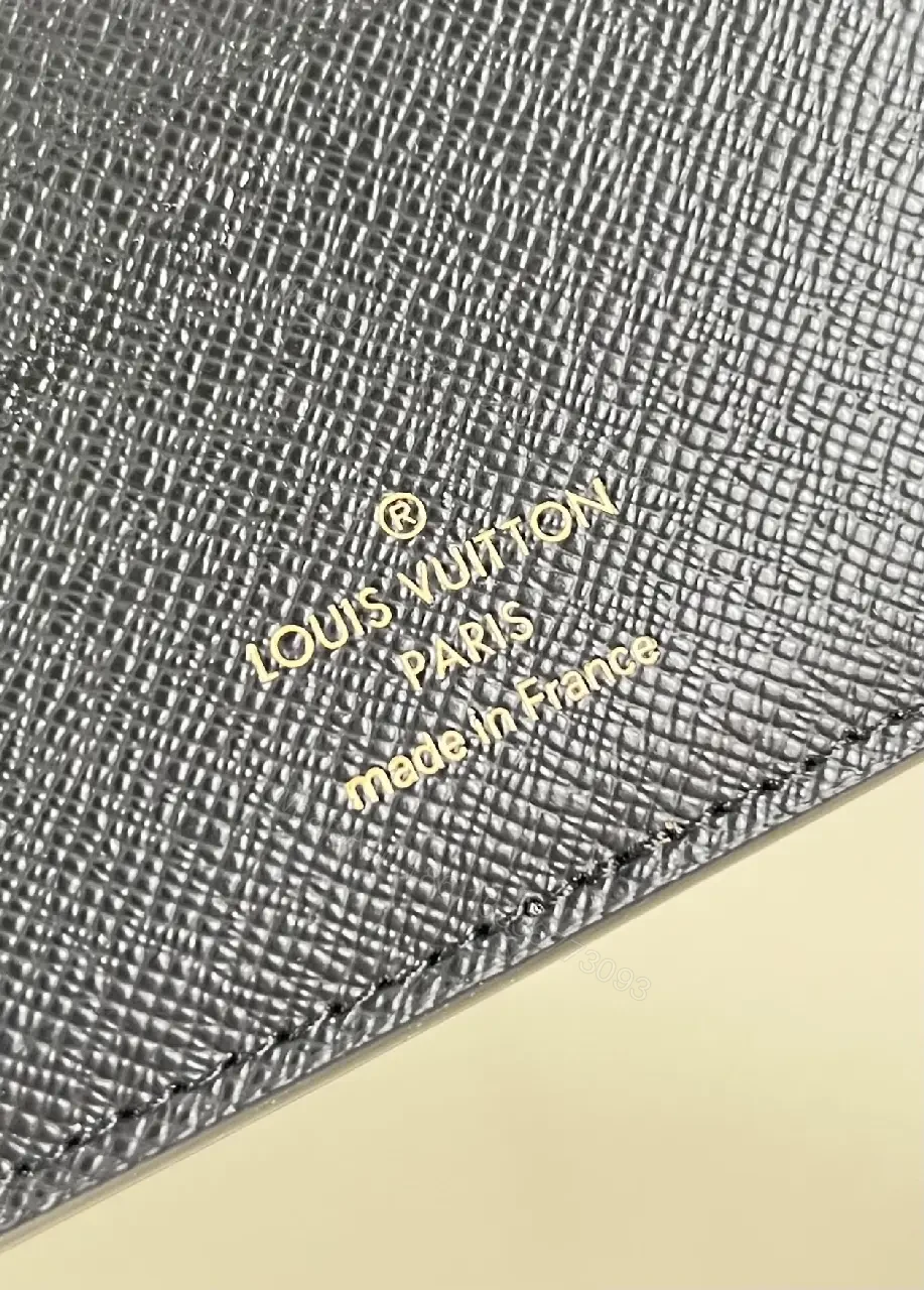 View 6 of Brown Monogram Canvas Bifold Wallet with LV Pattern, Vertical Zipless Style