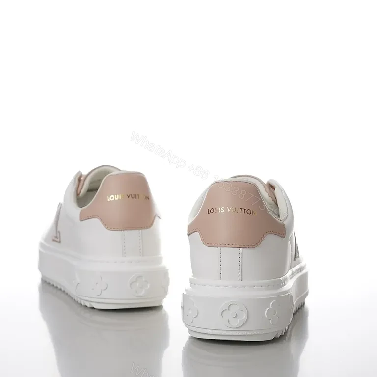 View 4 of Polished Everyday Comfort: White Leather Sneaker with Blush LV Accent