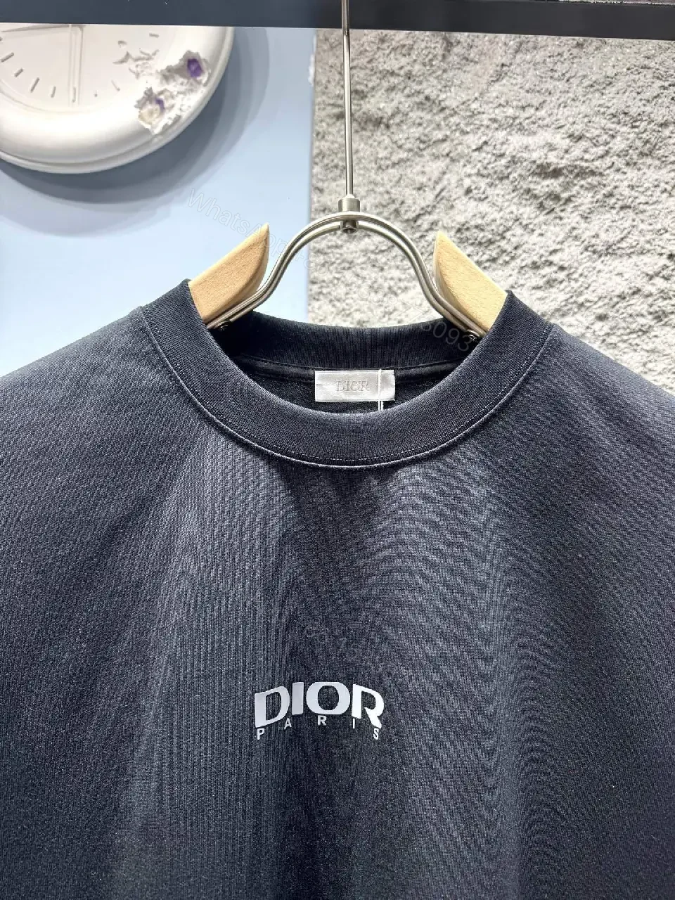 View 10 of Minimalist Black Tee with Subtle Logo – Everyday Luxe Tee