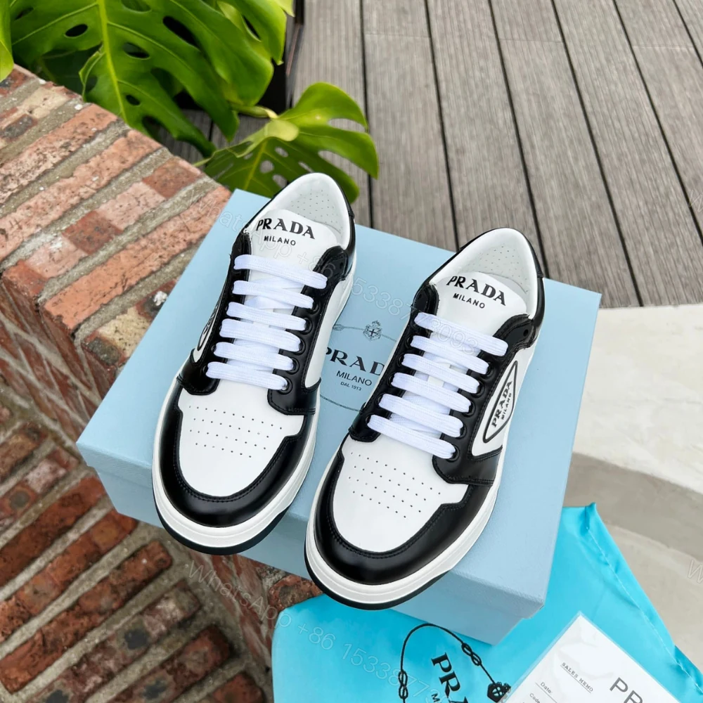 View 2 of Prada District Leather Sneaker Black White 1E790M 3LJ6 F0964 F 030