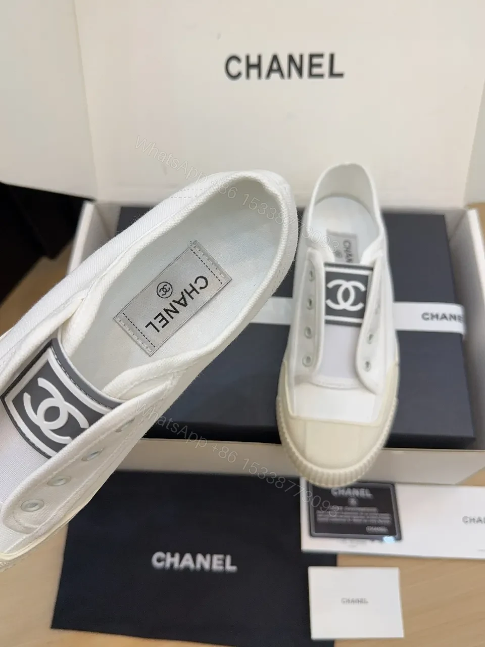View 3 of Refined Canvas Sneaker: Luxe Logo-Front High-Top Comfort