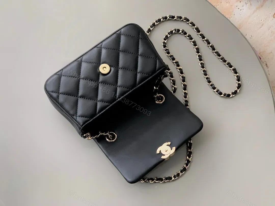 View 2 of Quilted Black Faux Leather Bag with Gold-Close Compact Evening Bag