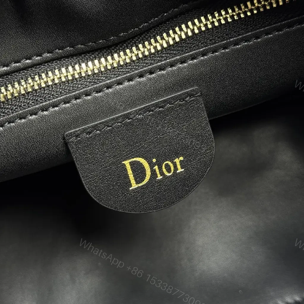 View 5 of Quilted Black Satchel: Gold Charm, Compact Luxury Bag