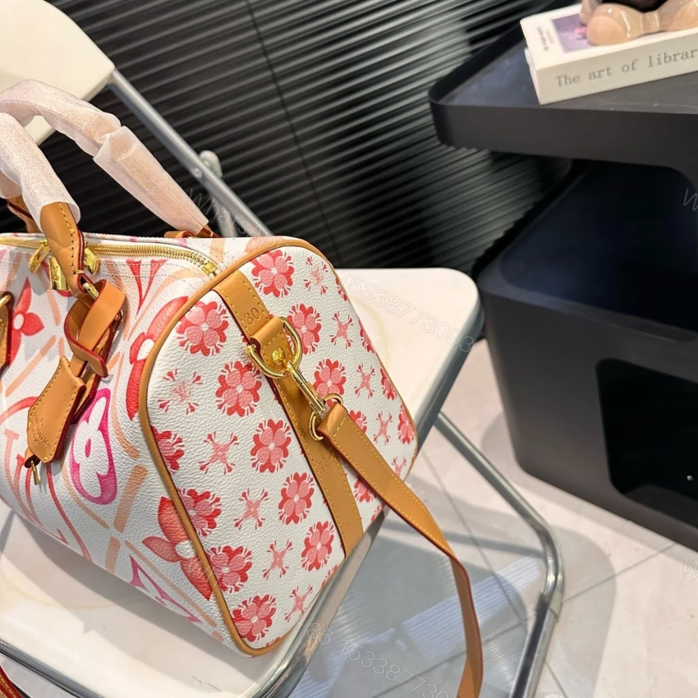 View 4 of Louis Vuitton Speedy Bandoulière 30 Other Monogram Canvas Coral 30Cm M11209