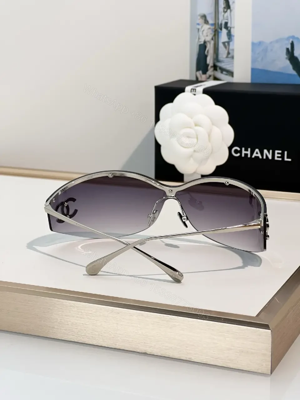 View 6 of Lux Black Gold Shield Sunglasses with Chanel Logo