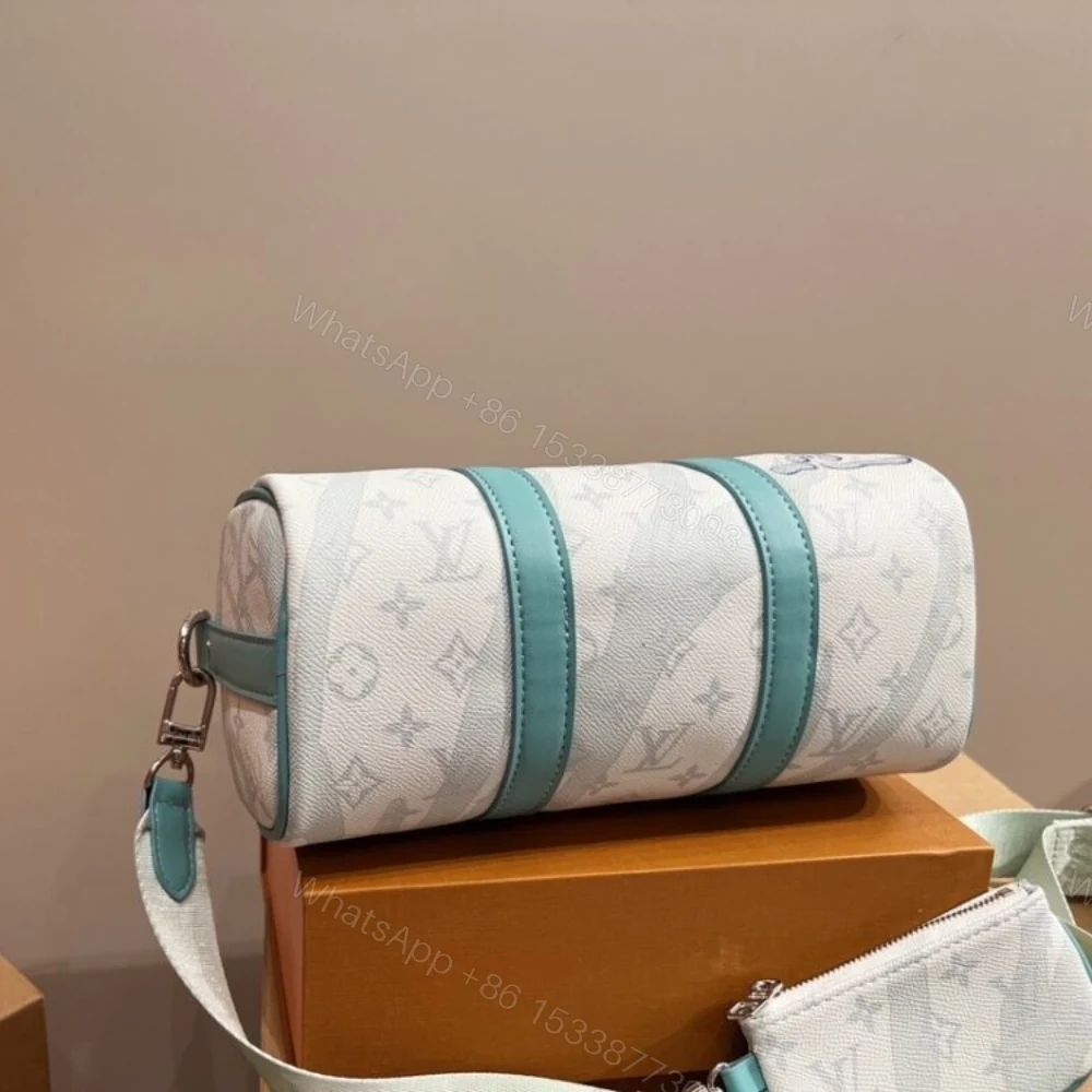 View 6 of Louis Vuitton Keepall Bandouliere Crystal Green 25Cm M22527