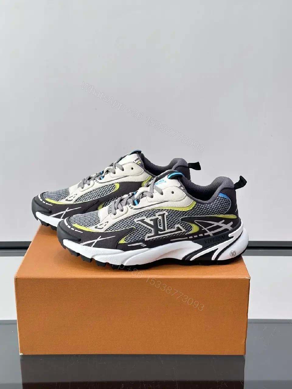 View 9 of Gray/Black Mesh Leather Sneaker with LV Accents, Sporty Chunky Style