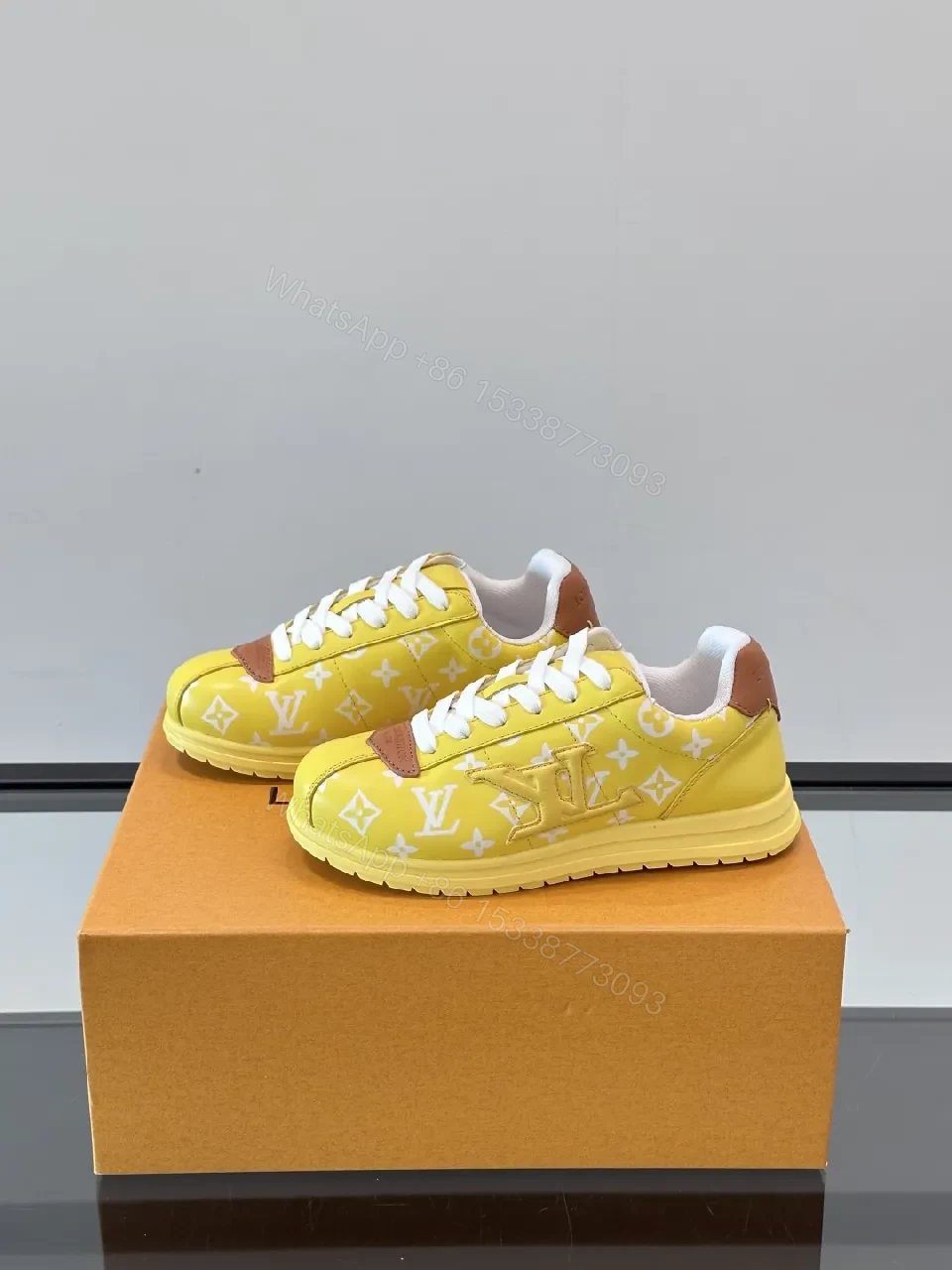 View 4 of Sunny Yellow Monogram Sneaker: Luxe Comfort & Street Style