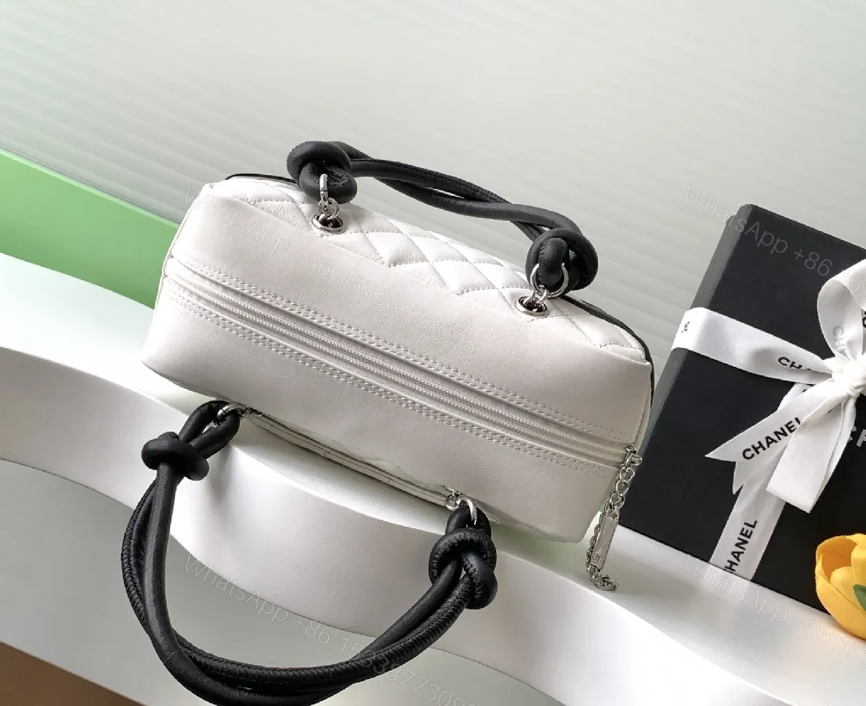 View 5 of Quilted Mini Bag with Signature Hardware - Dual-Tone Chic
