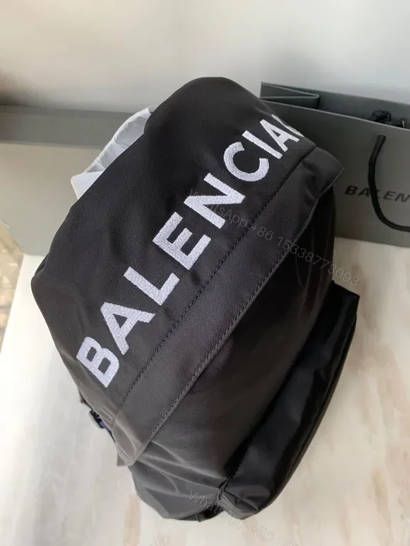 View 4 of Urban Nylon Backpack with Logo Strap â€” Everyday Luxury Bag