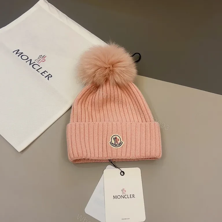 View 9 of Chic Pink Moncler Beanie with Pom-Pomâ€”All-Day Warmth