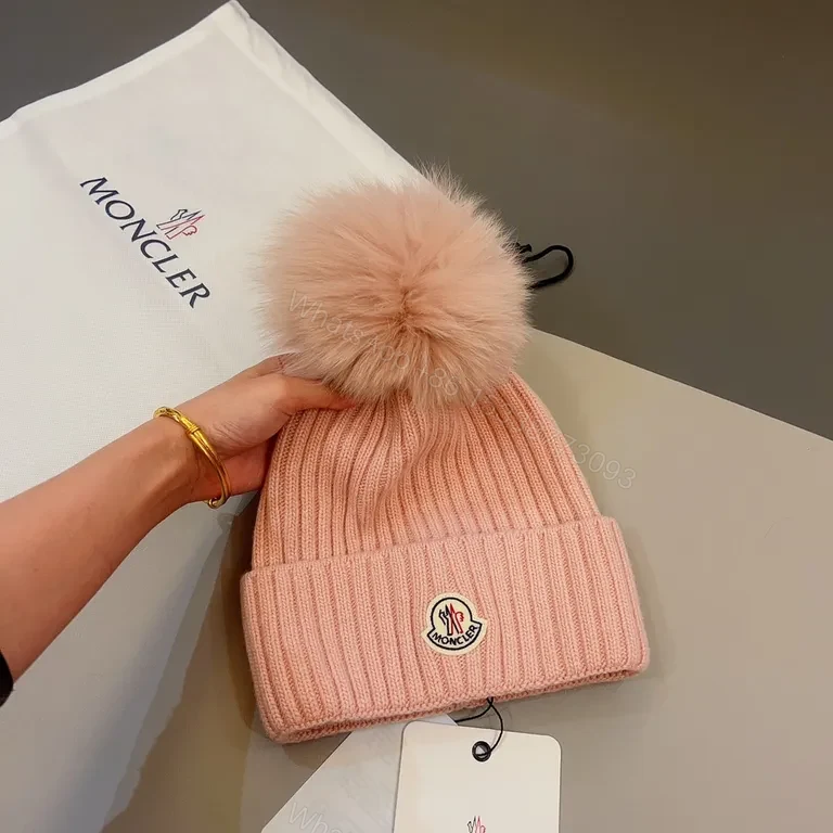 View 8 of Chic Pink Moncler Beanie with Pom-Pomâ€”All-Day Warmth