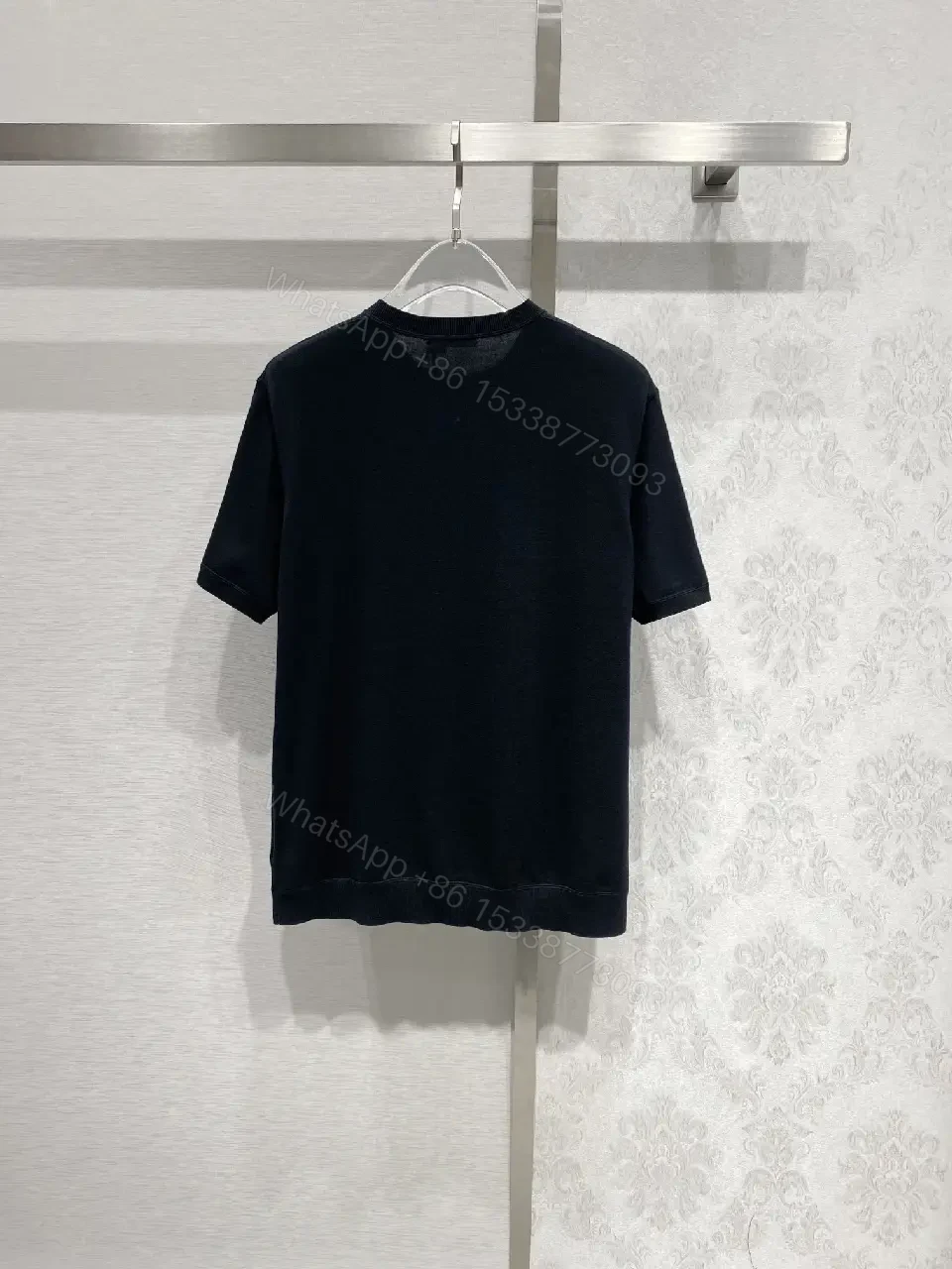 View 6 of Minimalist Cotton Tee with Crest – Elevated Everyday Essential