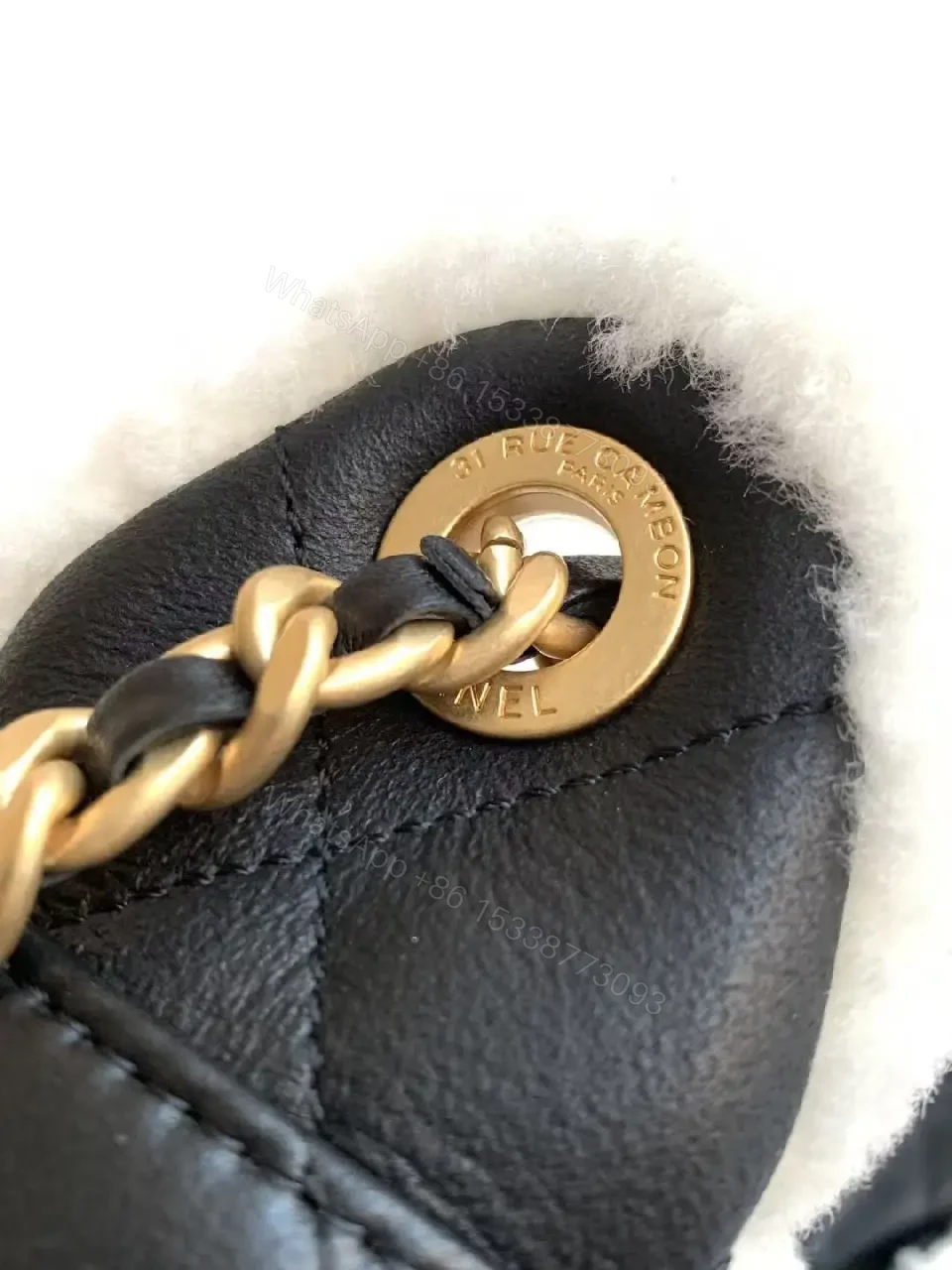View 2 of Quilted Mini Bag with Faux Shearling Trim - Compact Luxury