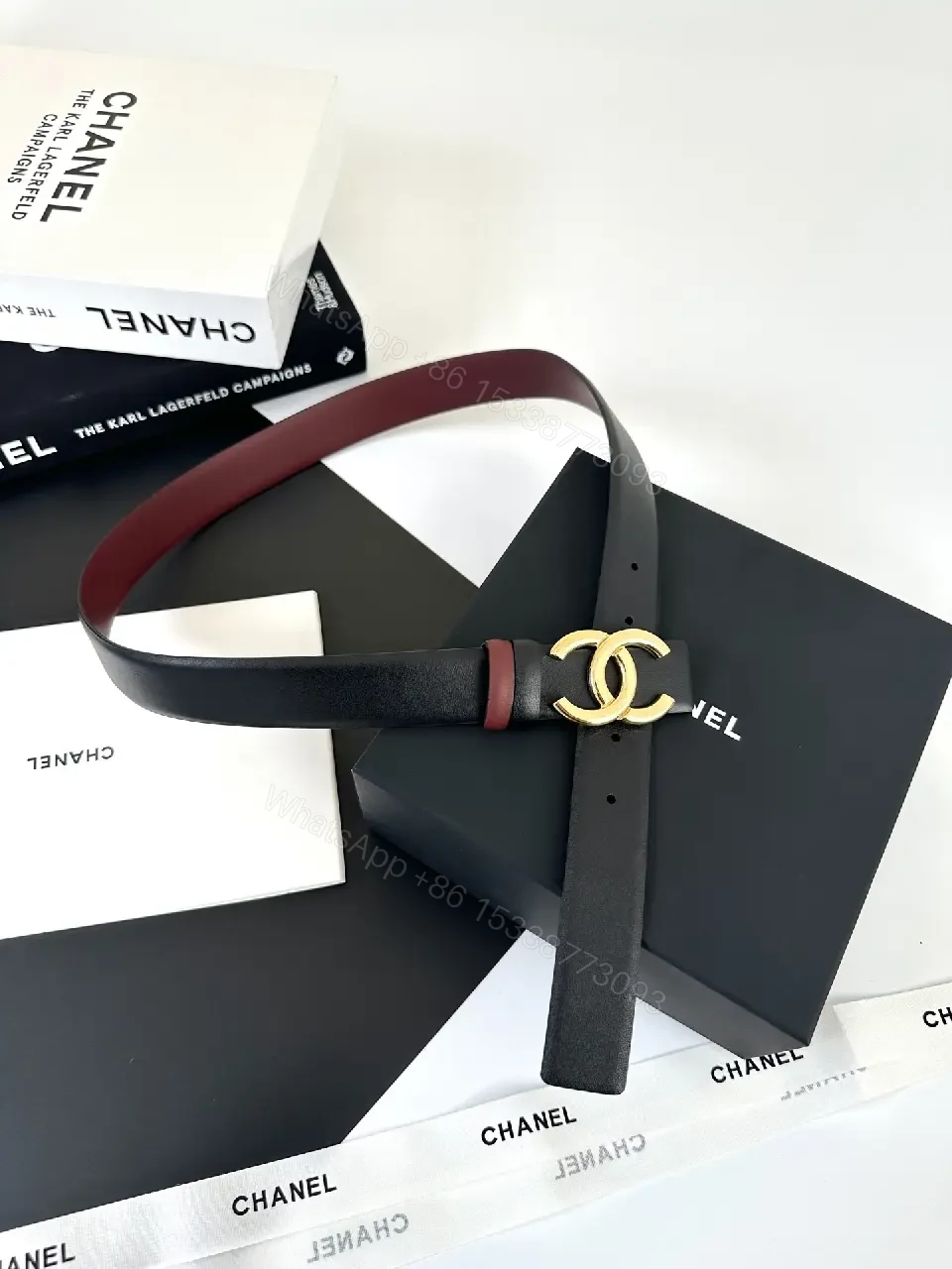 View 6 of Two-Tone Black/Burgundy Leather Belt with Gold Logo Buckle