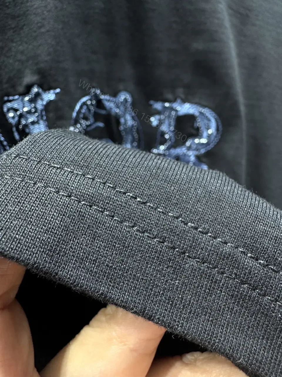 View 7 of Black Cotton Tee – Distressed Logo, Modern Streetwear Top