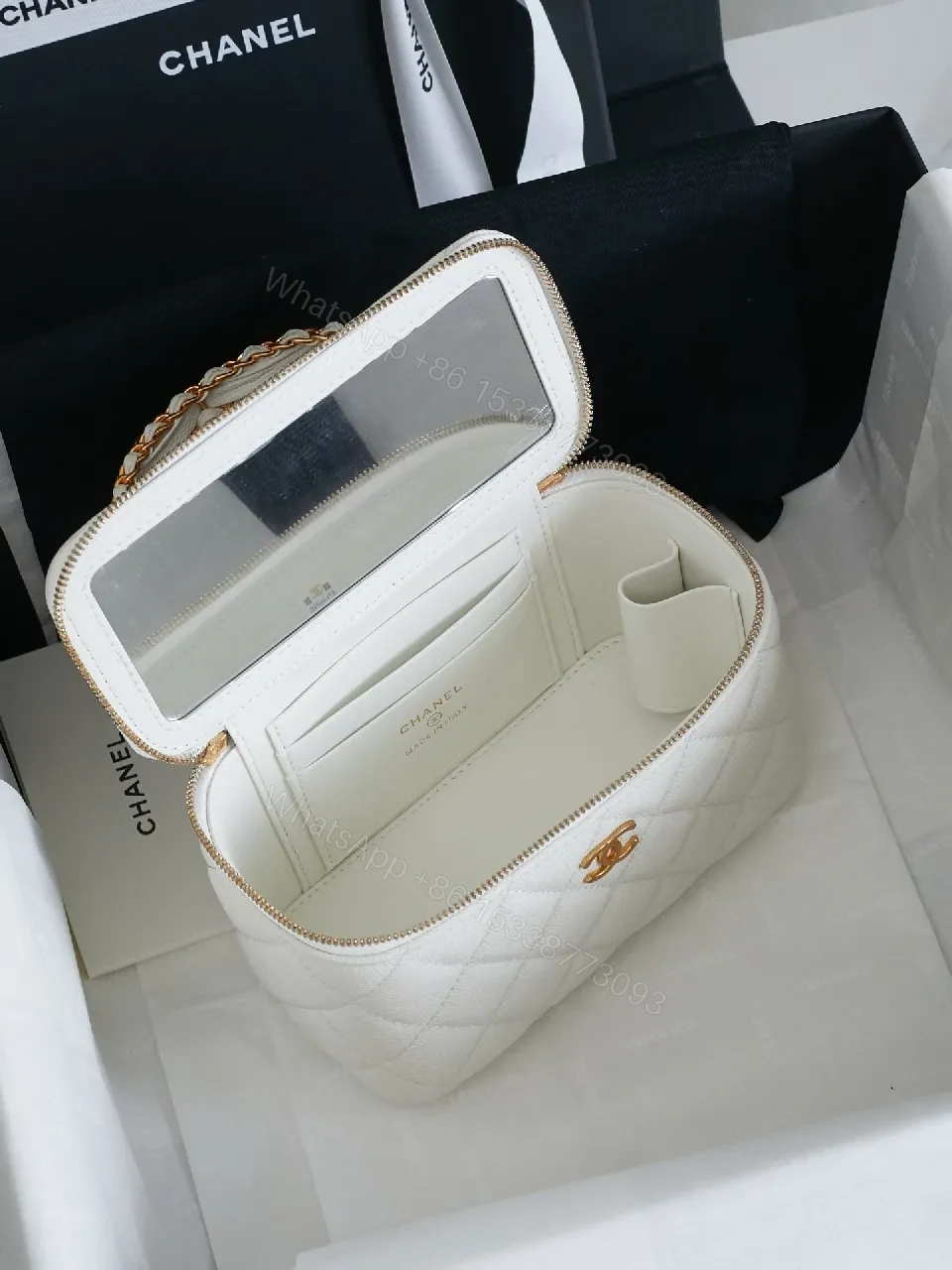 View 2 of White Quilted Mini Bag with Gold Chain