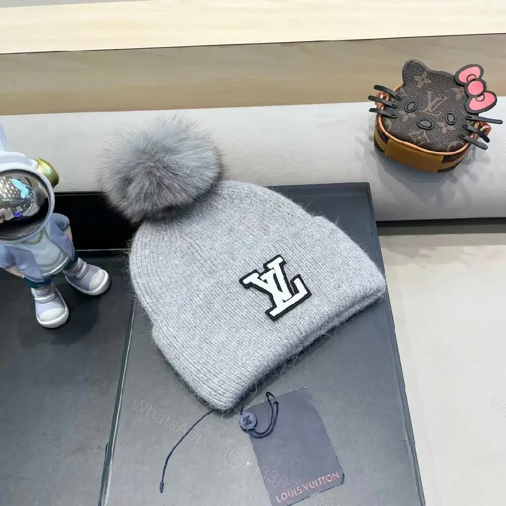 View 3 of Cozy Gray Knit Beanie with LV Emblem Accent