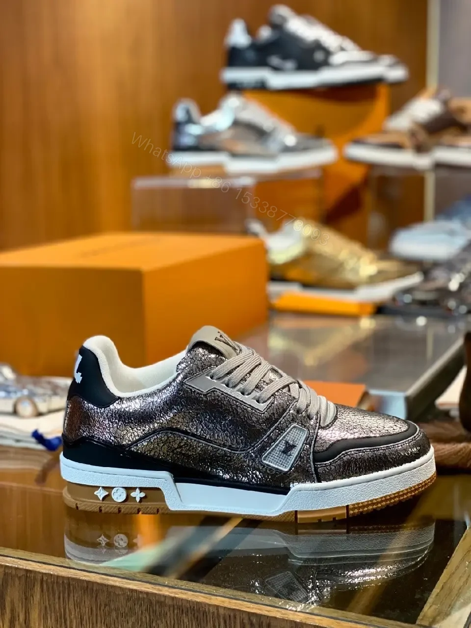 View 6 of Metallic Leather High-Top Sneakers with Subtle LV Detailing