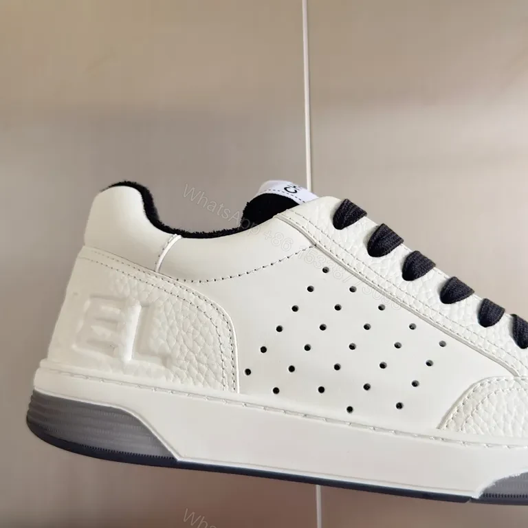 View 8 of Clean White Chanel-Inspired Court Sneakers with Bold Black Laces