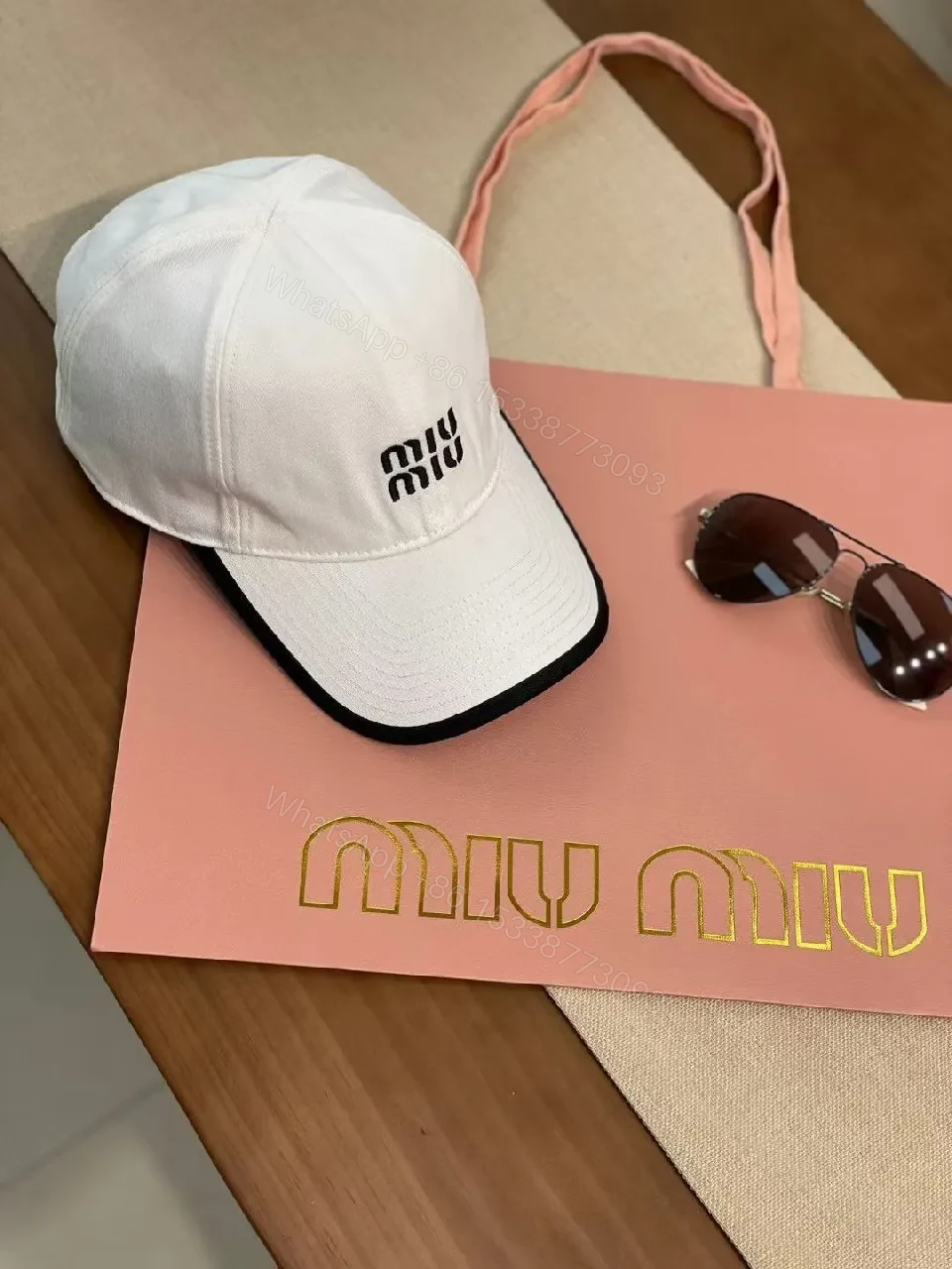 View 4 of White Cotton Cap | Structured Six-Panel, Logo Detail, Adjustable Fit