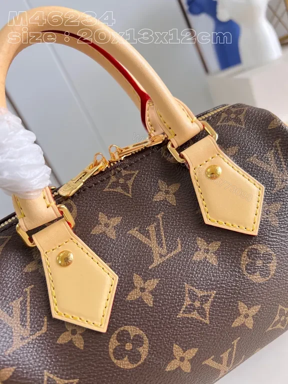 View 3 of Structured Monogram Mini Tote: Compact, All-Season Luxury