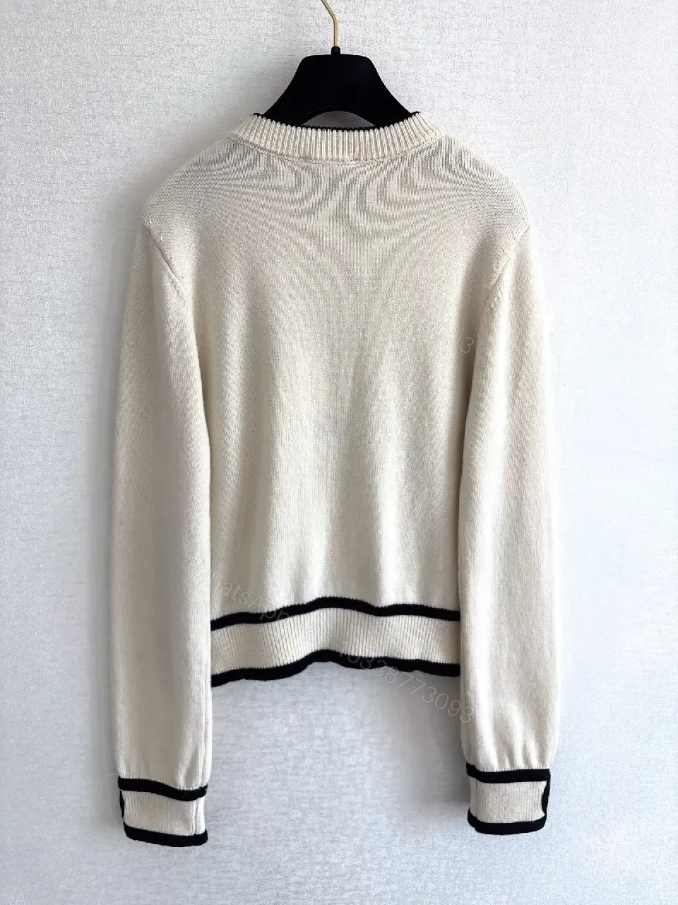 View 3 of Cream Knit Cardigan: Clean Lines, Subtle Contrast, Everyday Luxury