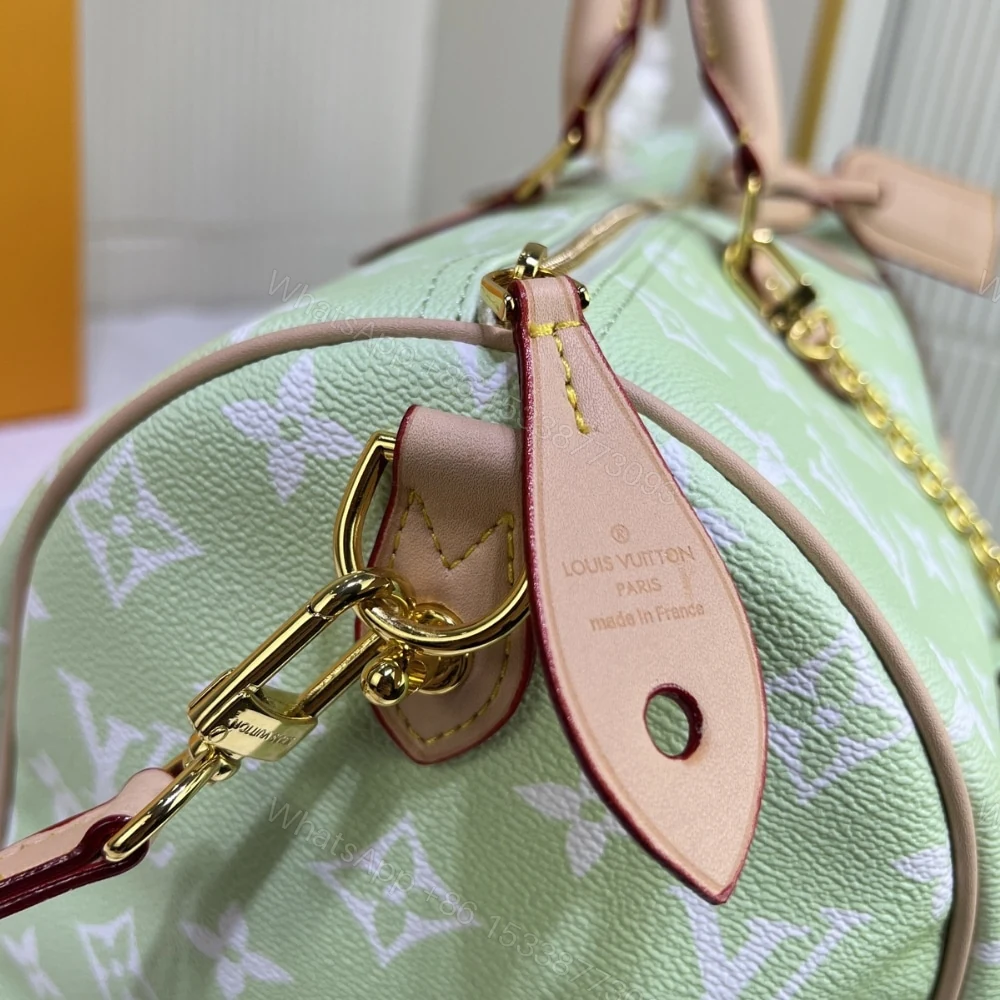 View 5 of Louis Vuitton Speedy P9 Bandoulière 25 Mint 40Cm