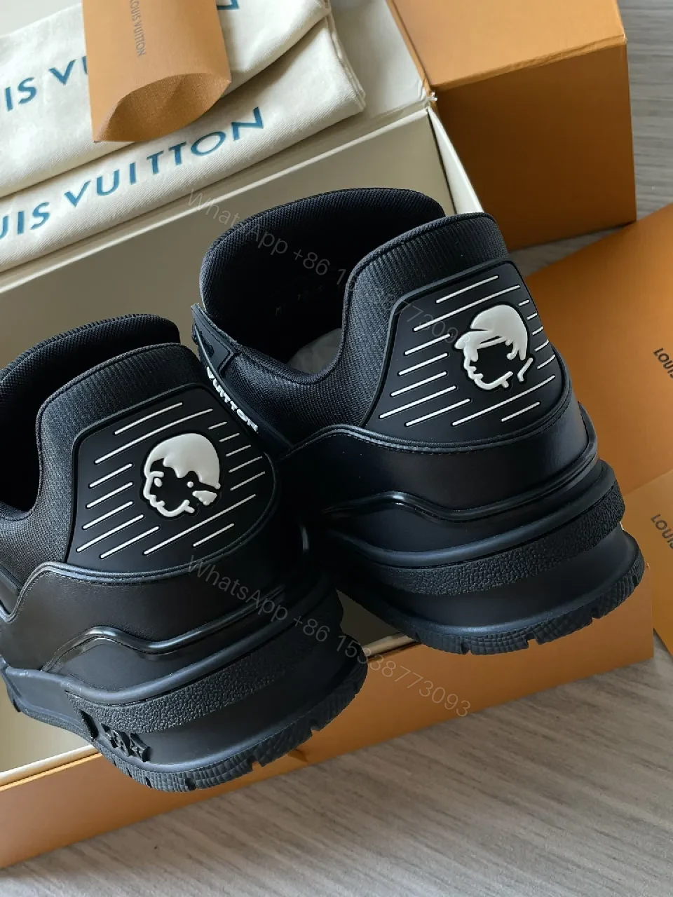 View 2 of Black Leather High‐Top Sneakers with LV Embellishments