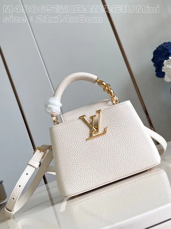 Pristine White Pebbled Mini Bag with LV Hardware — view 1