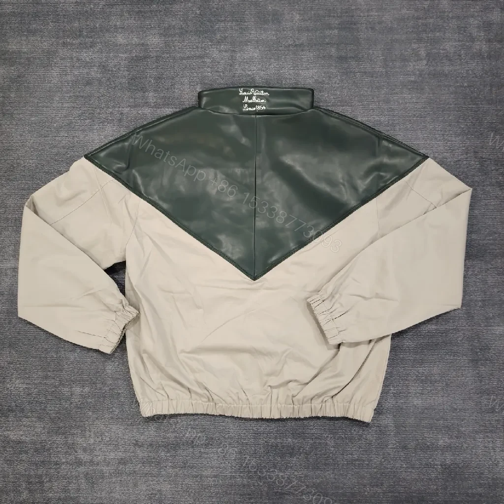 View 8 of Color-blocked Leather-Texture Windbreaker with LV-Inspired Accent