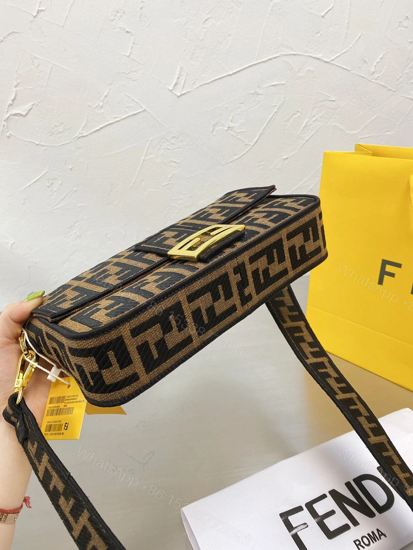 View 6 of Fendi Baguette Bag Aus Canvas In Braun