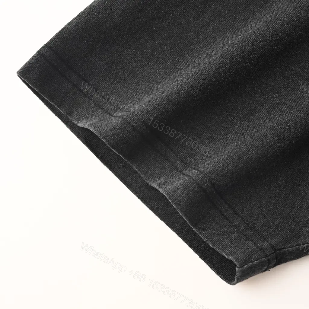 View 10 of Minimalist Black Cotton Tee with Subtle Red Embroidery