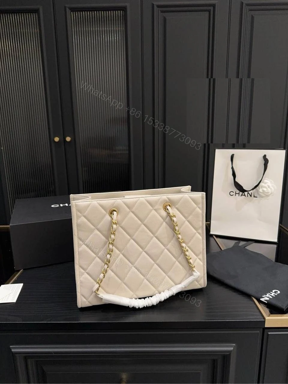 View 2 of Chanel Metal Logo Shopping Tote Quilted Calfskin Small NEW