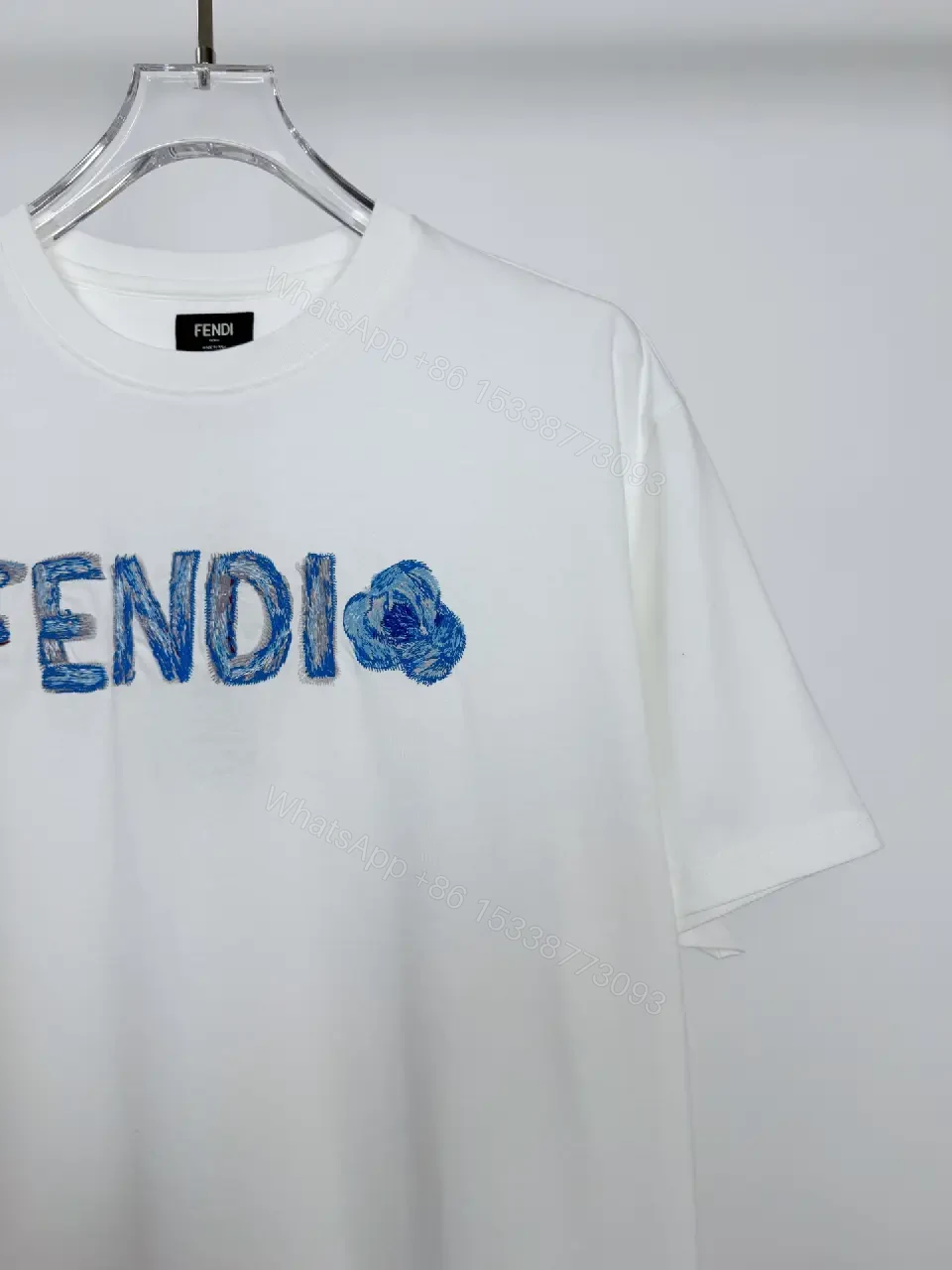View 6 of Lightweight White Cotton Tee + Embroidered Blue Logo + Minimalist + Designer Flair + T-Shirt