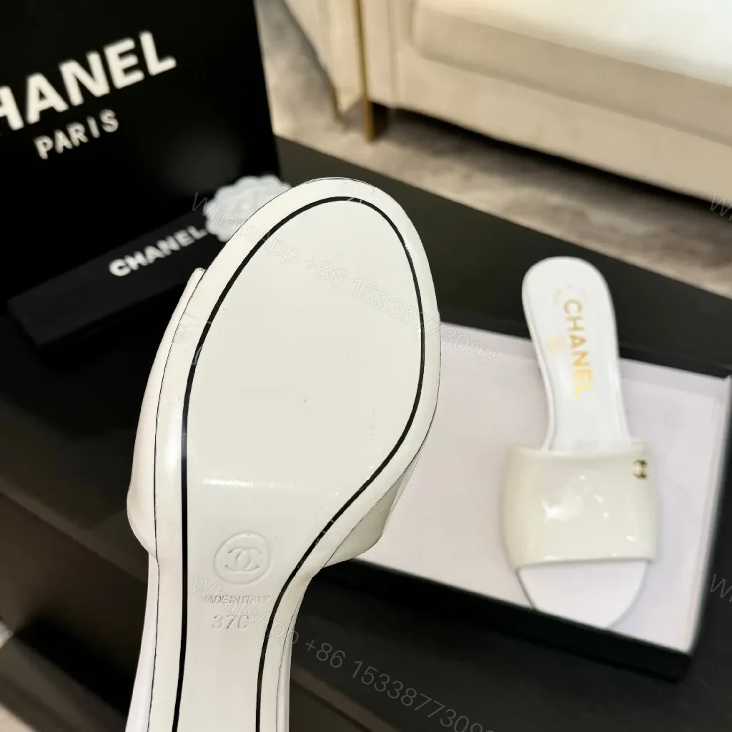 View 6 of White Patent Mules with Gold Logo – Elevating Everyday Glam