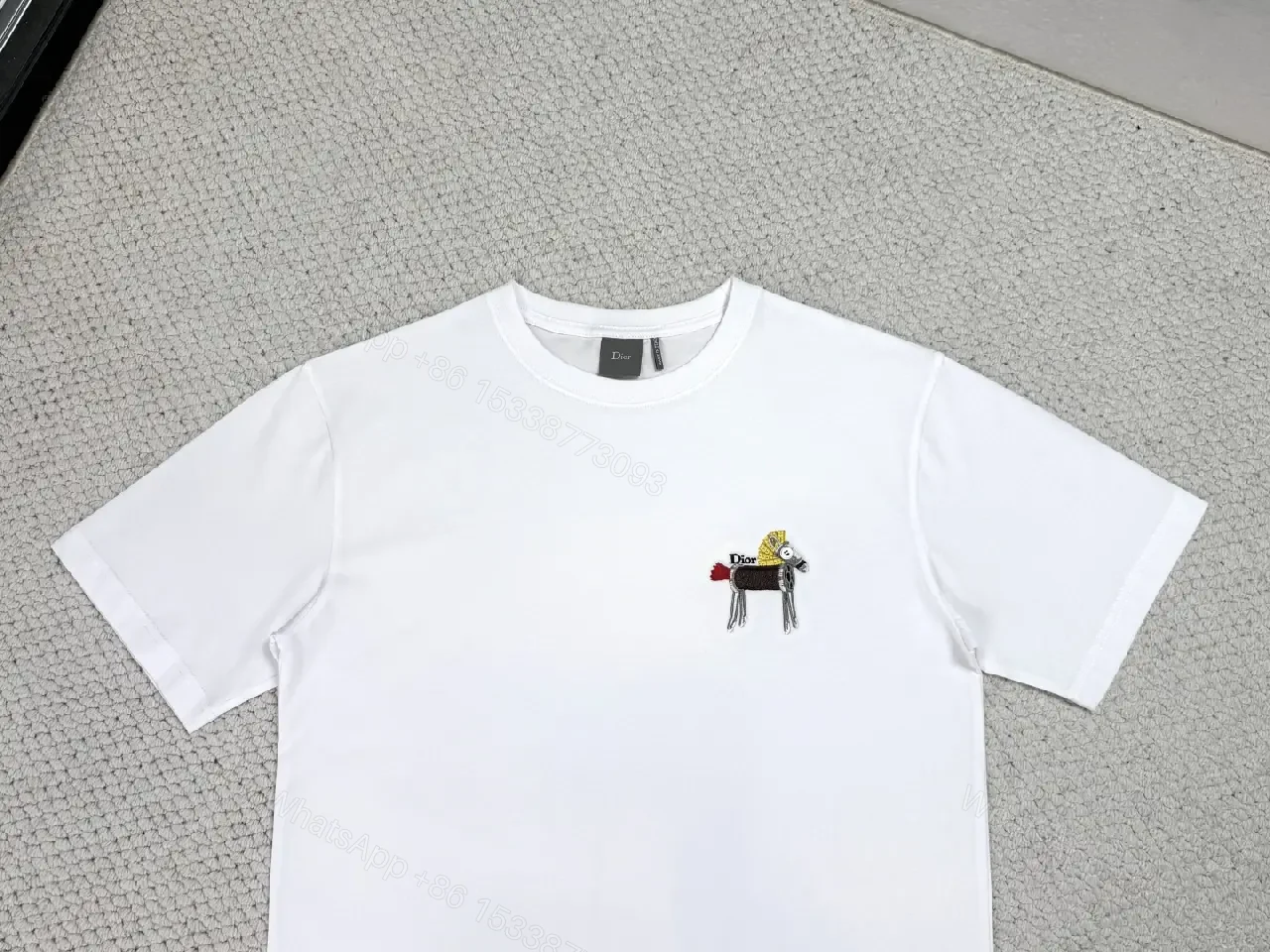 View 6 of White Cotton Tee with Tiny Dior Motif, Minimal Luxury, Everyday Essential