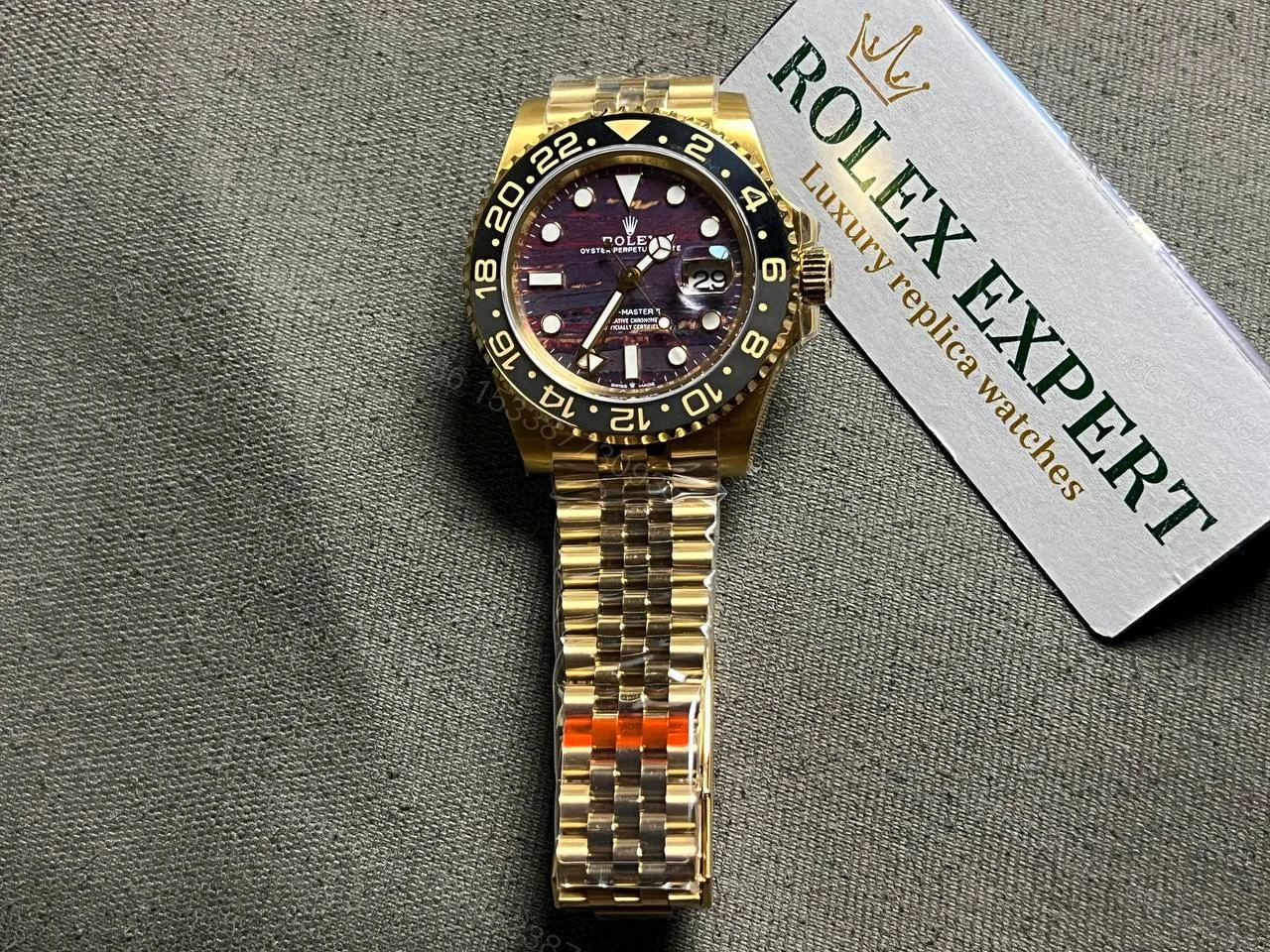 View 2 of Rolex GMT-Master II 126718GRNR Tiger Iron Dial
