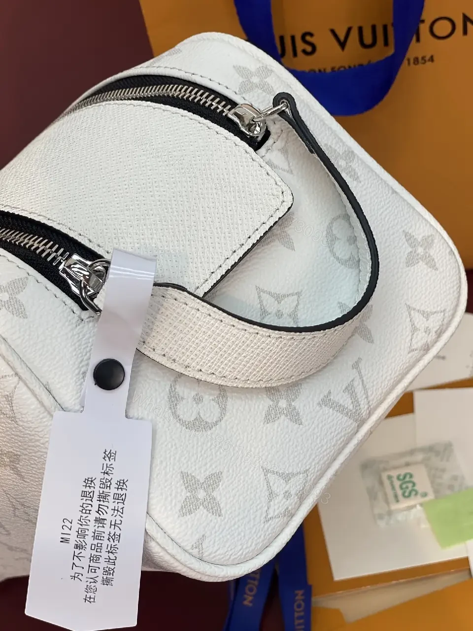 View 3 of White Leather Monogrammed Subtle LV-inspired Cosmetic Bag