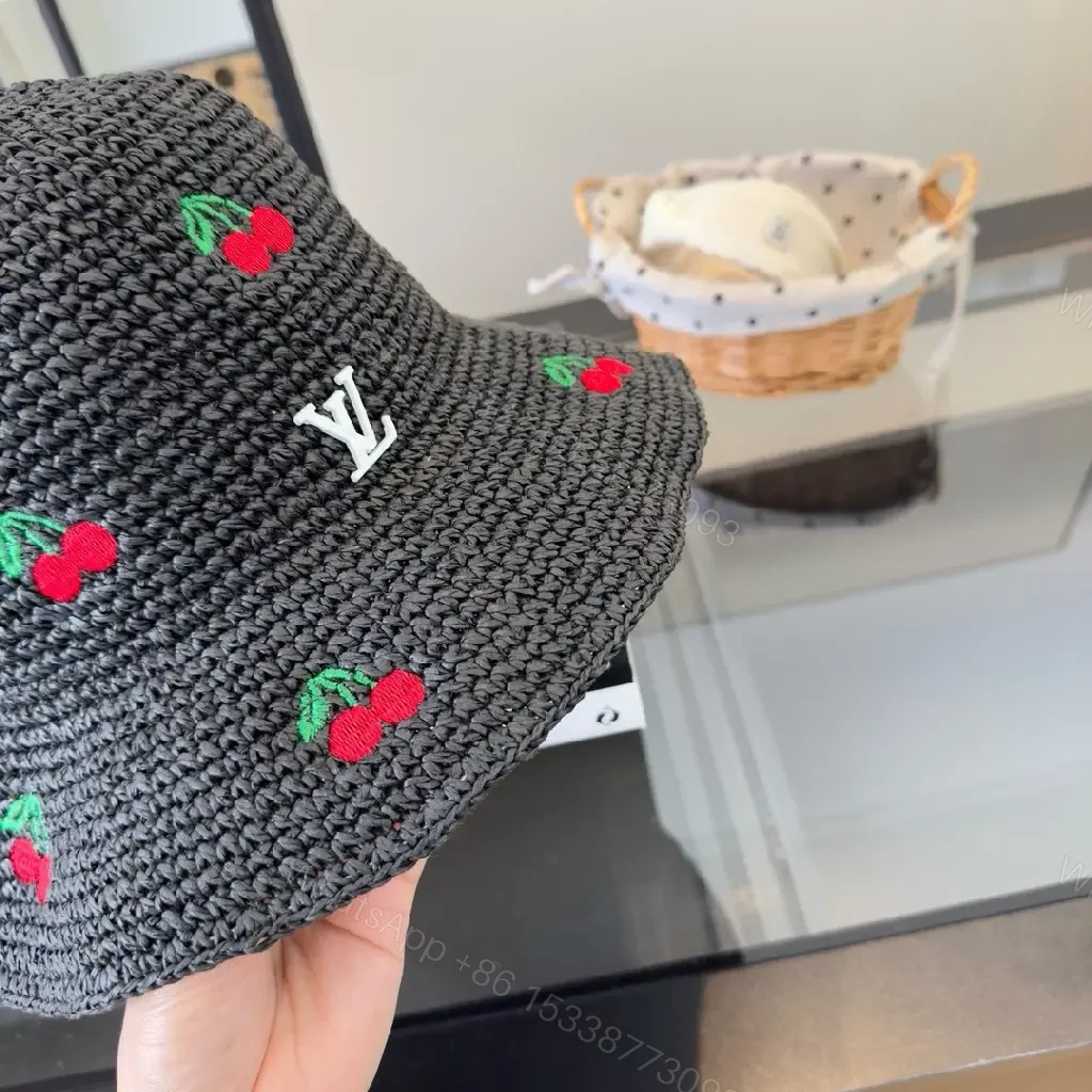 View 7 of Charcoal Crochet Bucket Hat with Cherry & LV Accent