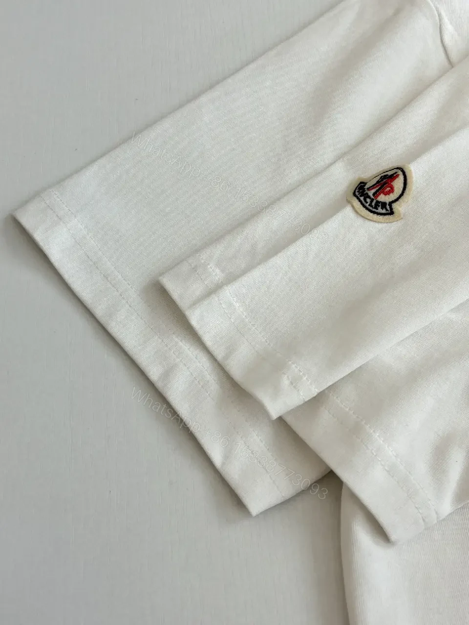 View 11 of White Cotton Tee Moncler Logo Crewneck Classic Streetwear Style Breathable Comfort T-Shirt